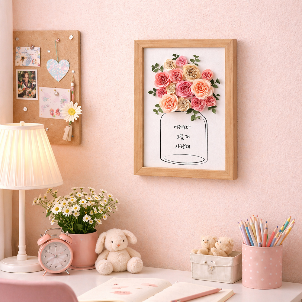 Pink rolled paper rose wall art frame displayed in a cozy room interior