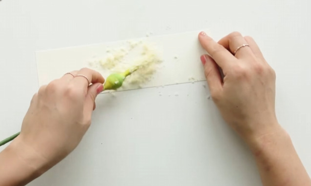 Adding artificial pollen powder to the handmade calla lily flower center
