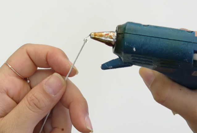 Making a small round glue ball on white floral wire for the hibiscus pistil