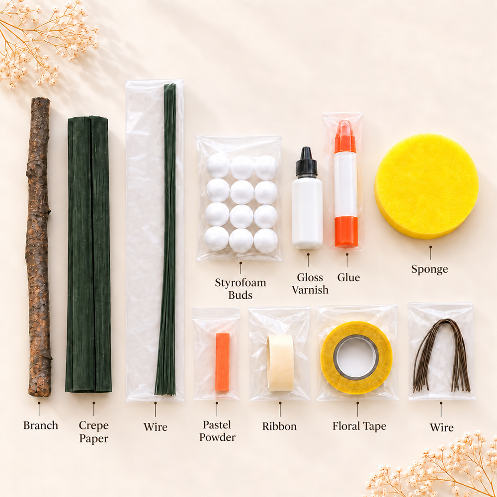 Materials for making a crepe paper kumquat garland, including crepe paper, Styrofoam balls, wire, floral tape, glue, pastel powder, ribbon, varnish, sponge, and a branch