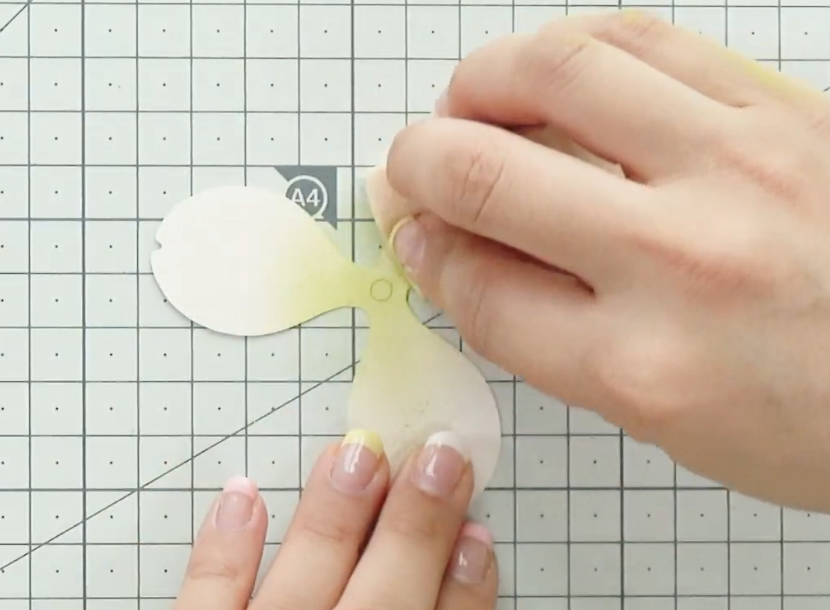 Adding light green pastel shading to pink paper tulip petals
