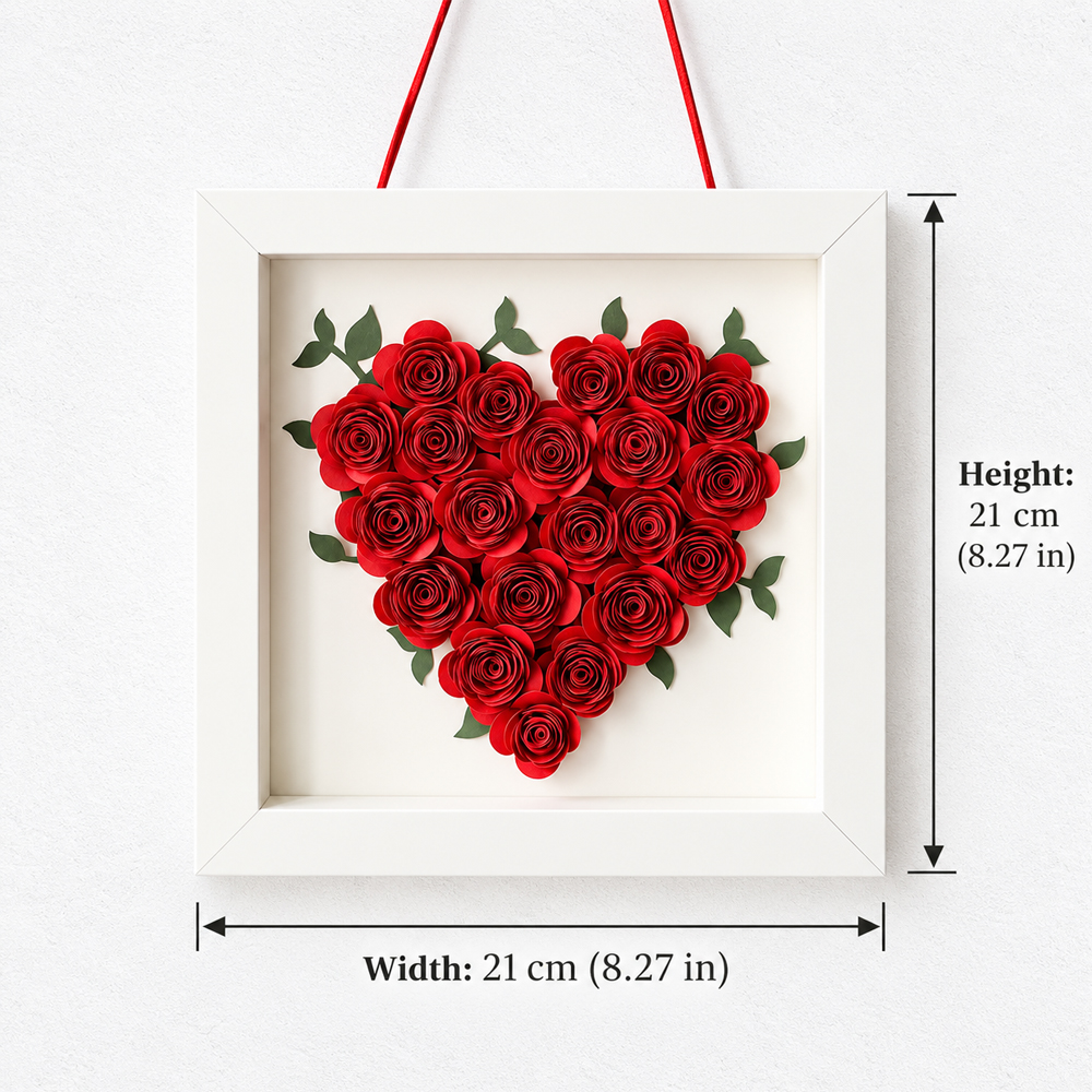Heart-shaped paper flower wall art measuring 21 cm square with red rolled paper roses in a white frame
