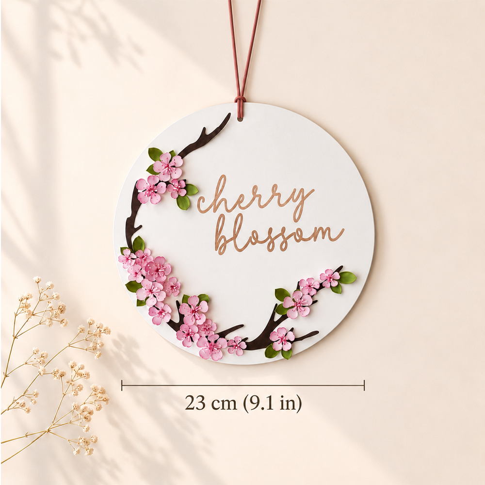 Finished paper cherry blossom wreath measuring 23 cm (9.1 in) with pink cardstock flowers and green leaves