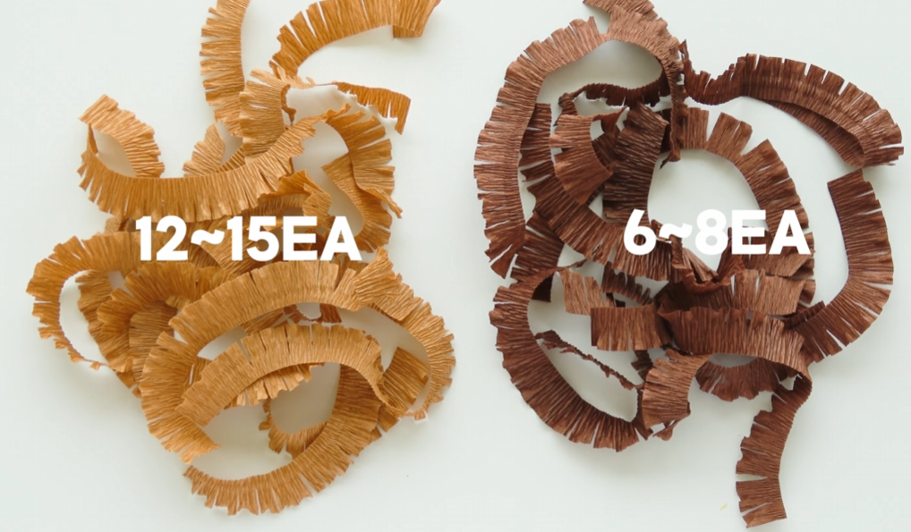 Prepared light brown and dark brown crepe paper fringes for the sunflower center